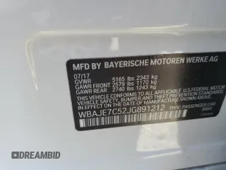 2018 BMW 5 Series 540i xDrive with VIN WBAJE7C52JG891212, listed as a Copart auction lot 58119195 with 73,770 mi miles and Salvage title. Bid and sale history available at DreamBid. Image 12.