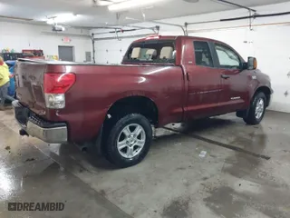 2008 Toyota Tundra 4WD Truck with VIN 5TBBV54168S497390, listed as a IAAI auction lot 41626116 with 231,007 mi miles. Bid and sale history available at carsss.com. Image 4.