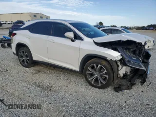 2020 Lexus RX with VIN 2T2HZMAA9LC162741, listed as a Copart auction lot 47083335 with 27,952 mi miles and Salvage Title. Bid and sale history available at carsss.com. Image 4.