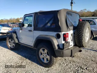 2010 Jeep Wrangler Rubicon with VIN 1J4BA6D17AL132002, listed as a Copart auction lot 83869124 with 183,507 mi miles and Salvage title. Bid and sale history available at DreamBid. Image 2.