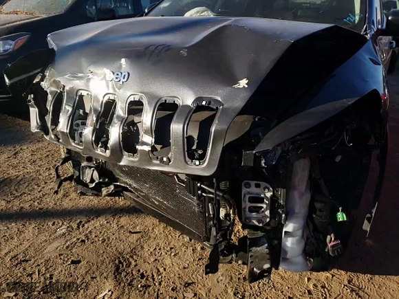 2015 Jeep Cherokee Latitude with VIN 1C4PJMCS4FW614989, listed as a Copart auction lot 75504624 with 144,244 mi miles and Salvage Title. Bid and sale history available at carsss.com. Image 11.