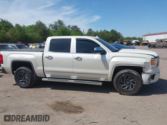 2015 GMC Sierra 1500 Denali with VIN 3GTU2WEJ7FG460695, listed as a IAAI auction lot 42023393 with 116,761 mi miles and . Bid and sale history available at DreamBid. Image 13.