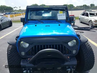 2015 Jeep Wrangler Unlimited Sport with VIN 1C4BJWDG1FL716400, listed as a IAAI auction lot 42645745 with 83,199 mi miles and . Bid and sale history available at DreamBid. Image 13.