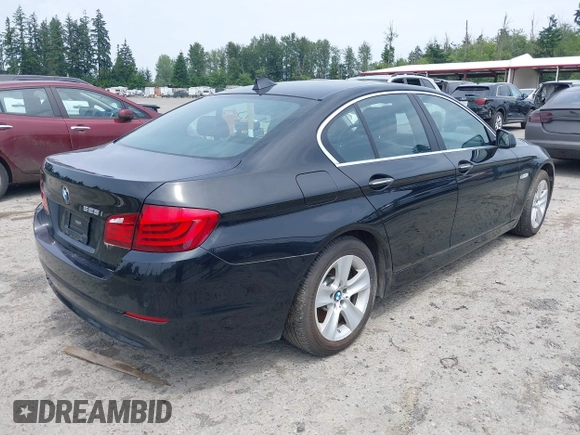 2013 BMW 5 Series 528i xDrive with VIN WBAXH5C59DDW14522, listed as a IAAI auction lot 42580923 with 106,400 mi miles and . Bid and sale history available at DreamBid. Image 4.