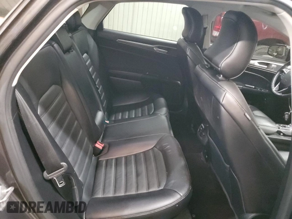 2017 Ford Fusion Hybrid SE z VIN 3FA6P0LU4HR226127, wystawiony jako Copart lot #50496455 z przebiegiem 98 027 mil mil oraz Szkoda całkowita • Salvage title. Historia ofert i sprzedaży dostępna na DreamBid. Obrazek 10.
