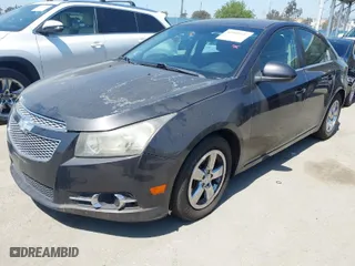 2014 Chevrolet Cruze 1LT with VIN 1G1PC5SB4E7117931, listed as a IAAI auction lot 41997100 with 150,910 mi miles. Bid and sale history available at carsss.com. Image 2.