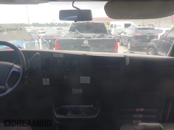 2013 Chevrolet Express Cargo with VIN 1GCSGAFX9D1179458, listed as a IAAI auction lot 42095702 with 212,186 mi miles and . Bid and sale history available at DreamBid. Image 19.
