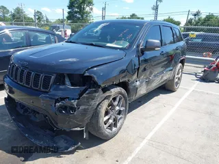 2021 Jeep Grand Cherokee Limited z VIN 1C4RJFBG4MC666557, wystawiony jako IAAI lot #42311088 z przebiegiem 126 808 mil mil oraz . Historia ofert i sprzedaży dostępna na DreamBid. Obrazek 2.