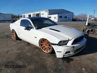 2013 Ford Mustang GT with VIN 1ZVBP8CF1D5208753, listed as a IAAI auction lot 41754011 with 158,809 mi miles. Bid and sale history available at carsss.com. Image 1.