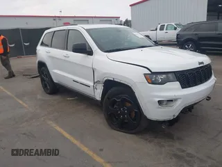2018 Jeep Grand Cherokee Laredo E with VIN 1C4RJFAG2JC503130, listed as a IAAI auction lot 41527333 with 95,669 mi miles. Bid and sale history available at carsss.com. Image 1.