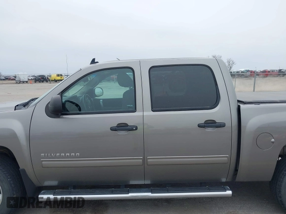 2013 Chevrolet Silverado 1500 LT with VIN 3GCPKSE73DG249856, listed as a IAAI auction lot 41973964 with 135,580 mi miles. Bid and sale history available at carsss.com. Image 14.