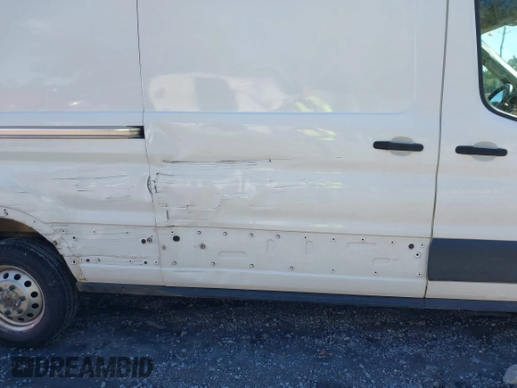 2023 Ford Transit Cargo with VIN 1FTBR2C8XPKA33372, listed as a IAAI auction lot 41735299 with 56,777 mi miles and . Bid and sale history available at DreamBid. Image 17.