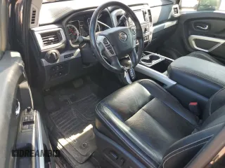 2018 Nissan Titan with VIN 1N6AA1C43JN549358, listed as a Copart auction lot 62417435 with 125,394 mi miles and Salvage title. Bid and sale history available at DreamBid. Image 8.