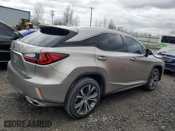 2018 Lexus RX with VIN 2T2BZMCA8JC135840, listed as a Copart auction lot 48567575 with 74,182 mi miles and Salvage Title. Bid and sale history available at carsss.com. Image 3.
