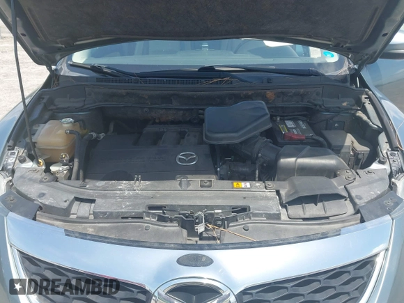 2012 Mazda CX-9 Grand Touring z VIN JM3TB2DA8C0354172, wystawiony jako IAAI lot #42739121 z przebiegiem 208 287 mil mil oraz . Historia ofert i sprzedaży dostępna na DreamBid. Obrazek 10.