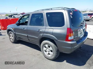 2003 Mazda Tribute ES with VIN 4F2CZ96113KM52877, listed as a IAAI auction lot 42217251 with 218,475 mi miles and . Bid and sale history available at DreamBid. Image 3.