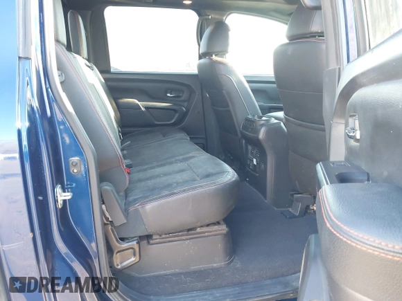 2021 Nissan Titan Pro-4X z VIN 1N6AA1ED1MN517476, wystawiony jako IAAI lot #41422217 z przebiegiem 62 650 mil mil oraz . Historia ofert i sprzedaży dostępna na DreamBid. Obrazek 8.