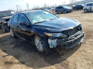 2019 Toyota Camry LE z VIN 4T1B11HK6KU754058, wystawiony jako IAAI lot #41791126 z przebiegiem 110 180 mil mil oraz . Historia ofert i sprzedaży dostępna na DreamBid. Obrazek 1.