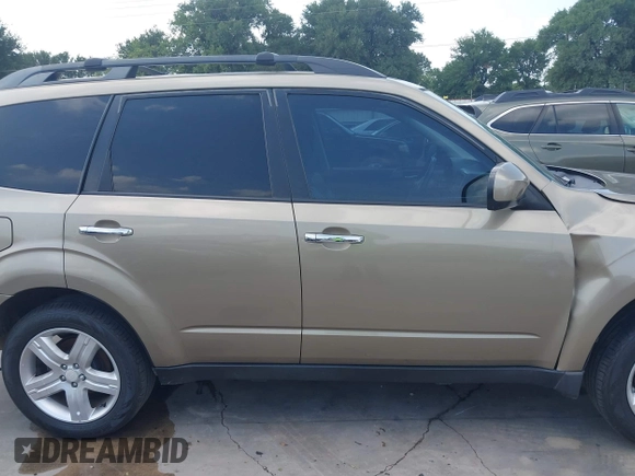 2009 Subaru Forester X Limited z VIN JF2SH64699H745428, wystawiony jako IAAI lot #42407890 z przebiegiem 131 716 mil mil oraz . Historia ofert i sprzedaży dostępna na DreamBid. Obrazek 13.