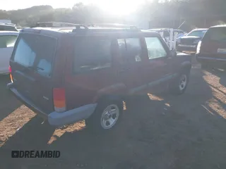 2001 Jeep Cherokee Sport with VIN 1J4FT48S11L539624, listed as a IAAI auction lot 41370117 with 120,052 mi miles. Bid and sale history available at carsss.com. Image 4.