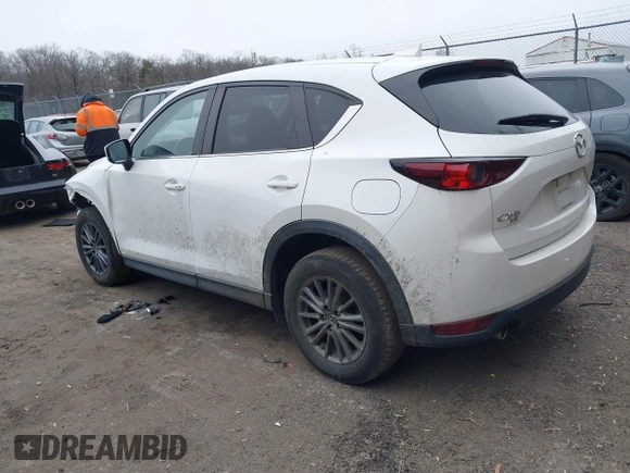 2020 Mazda CX-5 Touring with VIN JM3KFBCM5L1737640, listed as a IAAI auction lot 41613576 with 1 mi miles. Bid and sale history available at carsss.com. Image 3.