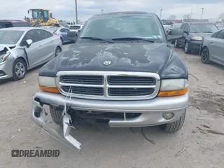 2004 Dodge Dakota SLT with VIN 1D7HG48N14S503851, listed as a IAAI auction lot 41883437 with 225,505 mi miles. Bid and sale history available at carsss.com. Image 12.
