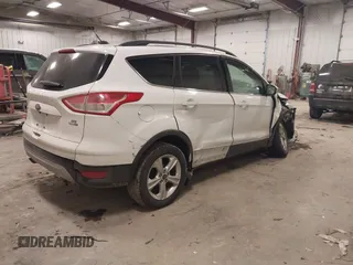 2016 Ford Escape SE with VIN 1FMCU9GX9GUC69153, listed as a IAAI auction lot 41504167 with 149,115 mi miles and . Bid and sale history available at DreamBid. Image 4.