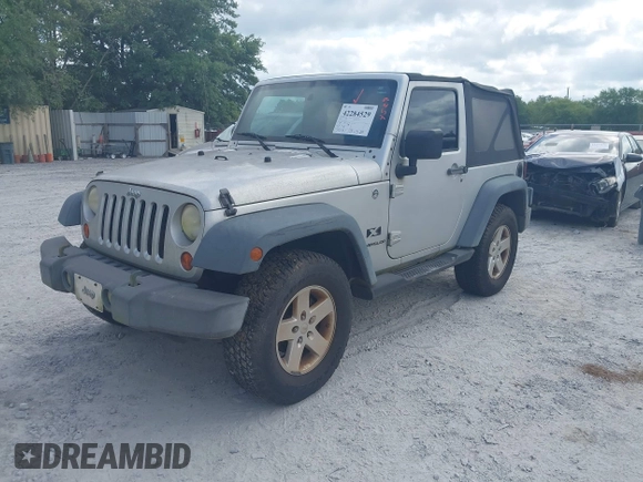 2008 Jeep Wrangler X with VIN 1J4FA24168L652177, listed as a IAAI auction lot 42284529 with 171,141 mi miles and . Bid and sale history available at DreamBid. Image 17.