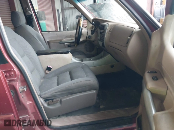 2002 Ford Explorer Sport Trac Value z VIN 1FMZU67E42UC82277, wystawiony jako IAAI lot #41903475 z przebiegiem 187 087 mil mil oraz . Historia ofert i sprzedaży dostępna na DreamBid. Obrazek 5.