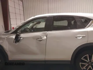 2018 Mazda CX-5 Touring with VIN JM3KFBCM7J0347769, listed as a IAAI auction lot 41611985 with 158,579 mi miles. Bid and sale history available at carsss.com. Image 15.