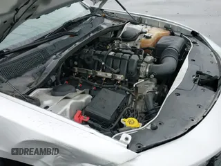 2019 Dodge Charger Police z VIN 2C3CDXKT0KH577258, wystawiony jako IAAI lot #42842148 z przebiegiem 119 064 mil mil oraz . Historia ofert i sprzedaży dostępna na DreamBid. Obrazek 20.