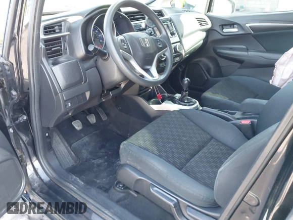 2015 Honda Fit LX with VIN 3HGGK5G5XFM737172, listed as a IAAI auction lot 42053332 with 80,690 mi miles. Bid and sale history available at carsss.com. Image 5.
