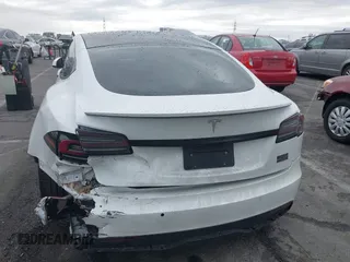 2022 Tesla Model S Plaid with VIN 5YJSA1E65NF488864, listed as a IAAI auction lot 41772788 with 33,915 mi miles and . Bid and sale history available at DreamBid. Image 16.