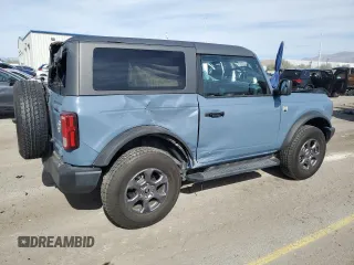 2023 Ford Bronco z VIN 1FMDE5AH6PLB63177, wystawiony jako Copart lot #52208625 z przebiegiem 10 865 mil mil oraz Szkoda całkowita • Salvage title. Historia ofert i sprzedaży dostępna na DreamBid. Obrazek 3.