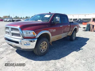 2017 Ram 2500 Laramie z VIN 3C6UR5FL6HG693953, wystawiony jako IAAI lot #41849571 z przebiegiem 99 754 mil mil oraz . Historia ofert i sprzedaży dostępna na DreamBid. Obrazek 2.