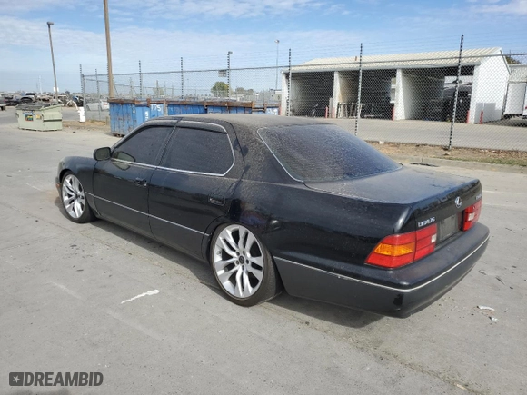 1999 Lexus LS 400 Luxury Sdn with VIN JT8BH28F7X0141873, listed as a Copart auction lot 77898024 with 235,914 mi miles and Salvage Title. Bid and sale history available at carsss.com. Image 2.