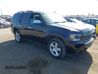 2007 Chevrolet Tahoe LTZ z VIN 1GNFC13087R389132, wystawiony jako IAAI lot #42057161 z przebiegiem 191 673 mil mil oraz . Historia ofert i sprzedaży dostępna na DreamBid. Obrazek 1.