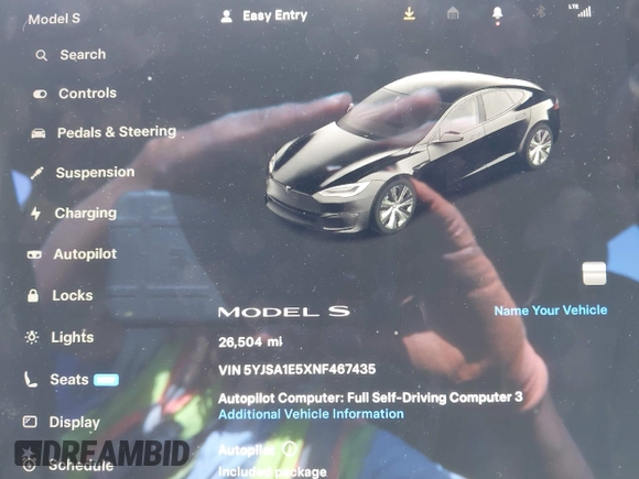 2022 Tesla Model S with VIN 5YJSA1E5XNF467435, listed as a IAAI auction lot 42538706 with 26,504 mi miles and . Bid and sale history available at DreamBid. Image 7.