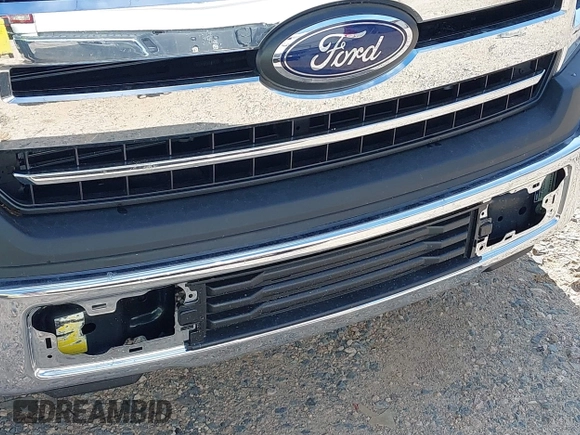 2019 Ford F-150 XL z VIN 1FTEX1CB8KKD31775, wystawiony jako IAAI lot #42522883 z przebiegiem 33 469 mil mil oraz . Historia ofert i sprzedaży dostępna na DreamBid. Obrazek 6.