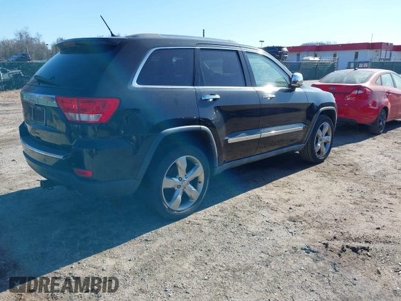 2011 Jeep Grand Cherokee Overland with VIN 1J4RS6GGXBC659349, listed as a IAAI auction lot 41778399 with 219,624 mi miles and . Bid and sale history available at DreamBid. Image 4.