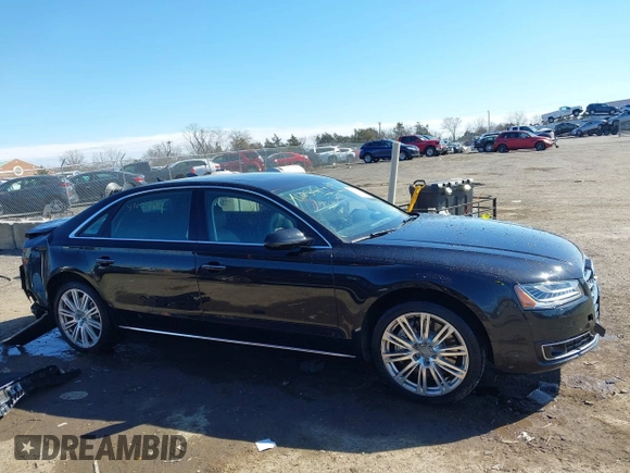 2015 Audi A8 L 4.0T with VIN WAU32AFD1FN021343, listed as a IAAI auction lot 41634469 with 88,229 mi miles. Bid and sale history available at carsss.com. Image 14.