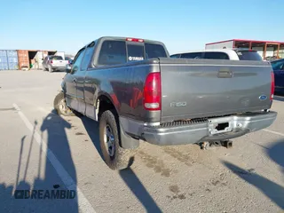 2002 Ford F-150 XL with VIN 1FTRX17L52NA85965, listed as a IAAI auction lot 41796633 with 171,814 mi miles. Bid and sale history available at carsss.com. Image 3.