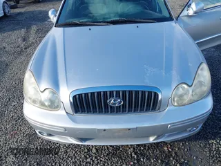 2005 Hyundai Sonata GLS with VIN KMHWF35H15A175265, listed as a IAAI auction lot 41512988 with 124,858 mi miles. Bid and sale history available at carsss.com. Image 6.