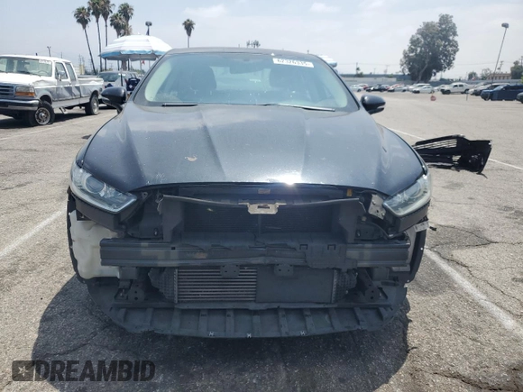 2013 Ford Fusion SE z VIN 3FA6P0H97DR215735, wystawiony jako Copart lot #62326335 z przebiegiem 100 312 mil mil oraz Szkoda całkowita • Salvage title. Historia ofert i sprzedaży dostępna na DreamBid. Obrazek 5.
