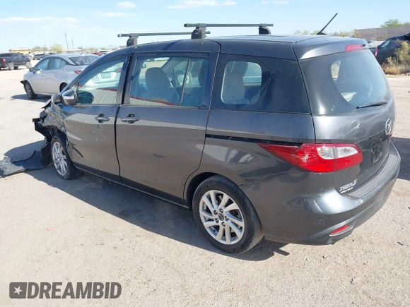 2013 Mazda 5 Sport with VIN JM1CW2BL4D0145725, listed as a IAAI auction lot 42190177 with 143,209 mi miles and . Bid and sale history available at DreamBid. Image 3.