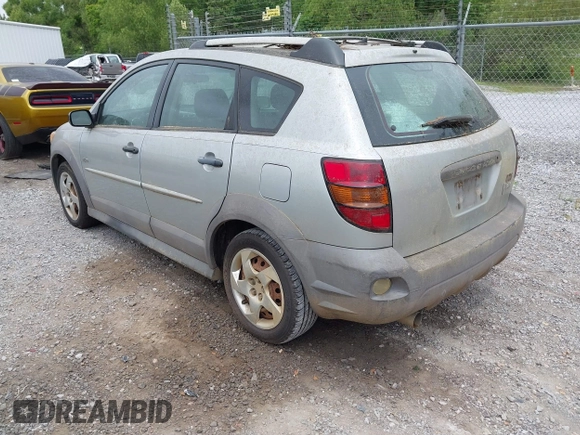 2004 Pontiac Vibe with VIN 5Y2SL62864Z465907, listed as a IAAI auction lot 42102597 with 164,548 mi miles. Bid and sale history available at carsss.com. Image 3.
