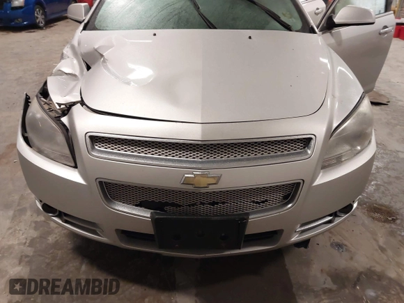 2012 Chevrolet Malibu LTZ with VIN 1G1ZG5E77CF375464, listed as a IAAI auction lot 41509140 with 197,329 mi miles and . Bid and sale history available at DreamBid. Image 12.