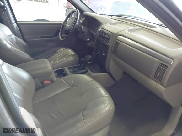 2001 Jeep Grand Cherokee Laredo with VIN 1J4GW48S91C525711, listed as a IAAI auction lot 42048952 with 1 mi miles. Bid and sale history available at carsss.com. Image 5.