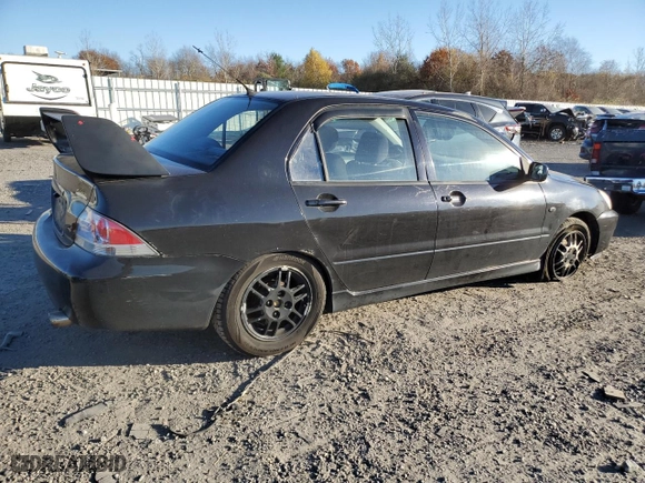 2006 Mitsubishi Lancer OZ-Rally with VIN JA3AJ86E16U059013, listed as a Copart auction lot 80056014 with 107,179 mi miles and Clean Title. Bid and sale history available at carsss.com. Image 3.
