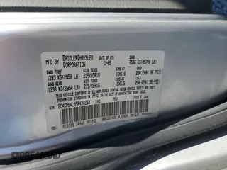 2005 Chrysler Town & Country Touring z VIN 2C4GP54L05R430233, wystawiony jako Copart lot #56189765 z przebiegiem 190 187 mil mil oraz Szkody całkowita. Historia ofert i sprzedaży dostępna na DreamBid. Obrazek 13.